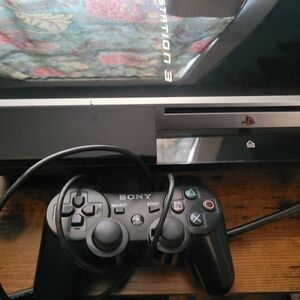 Sony PlayStation 3 Console with Black Controller and 7 games